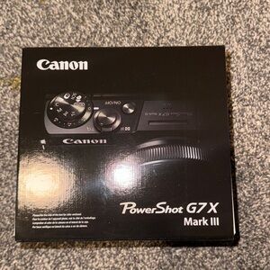 Canon G7X iii with pink cover and a black case